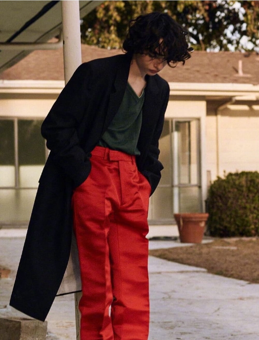 Finn Wolfhard is wearing Red Pants Men's Fashion Calvin Klein ASOS Men's