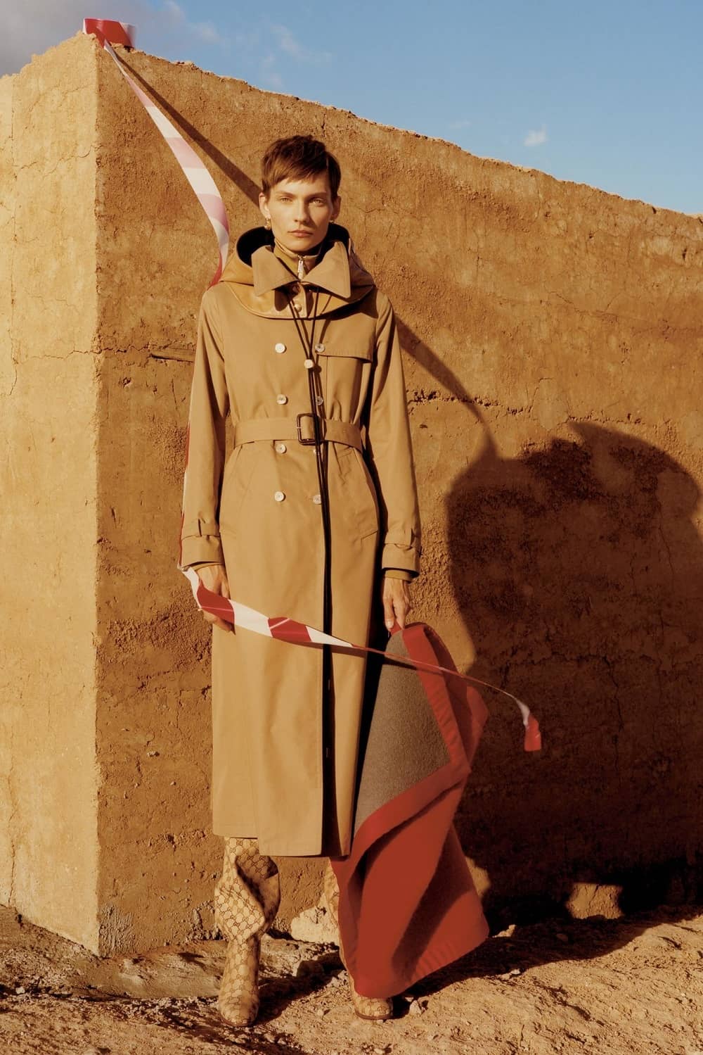 Karolin Wolter by Colin Dodgson for The New York Times Style Magazine May 2018 - Gucci Coat Jacket Boots - Salvatore Ferragamo Hood - Celine Blanket