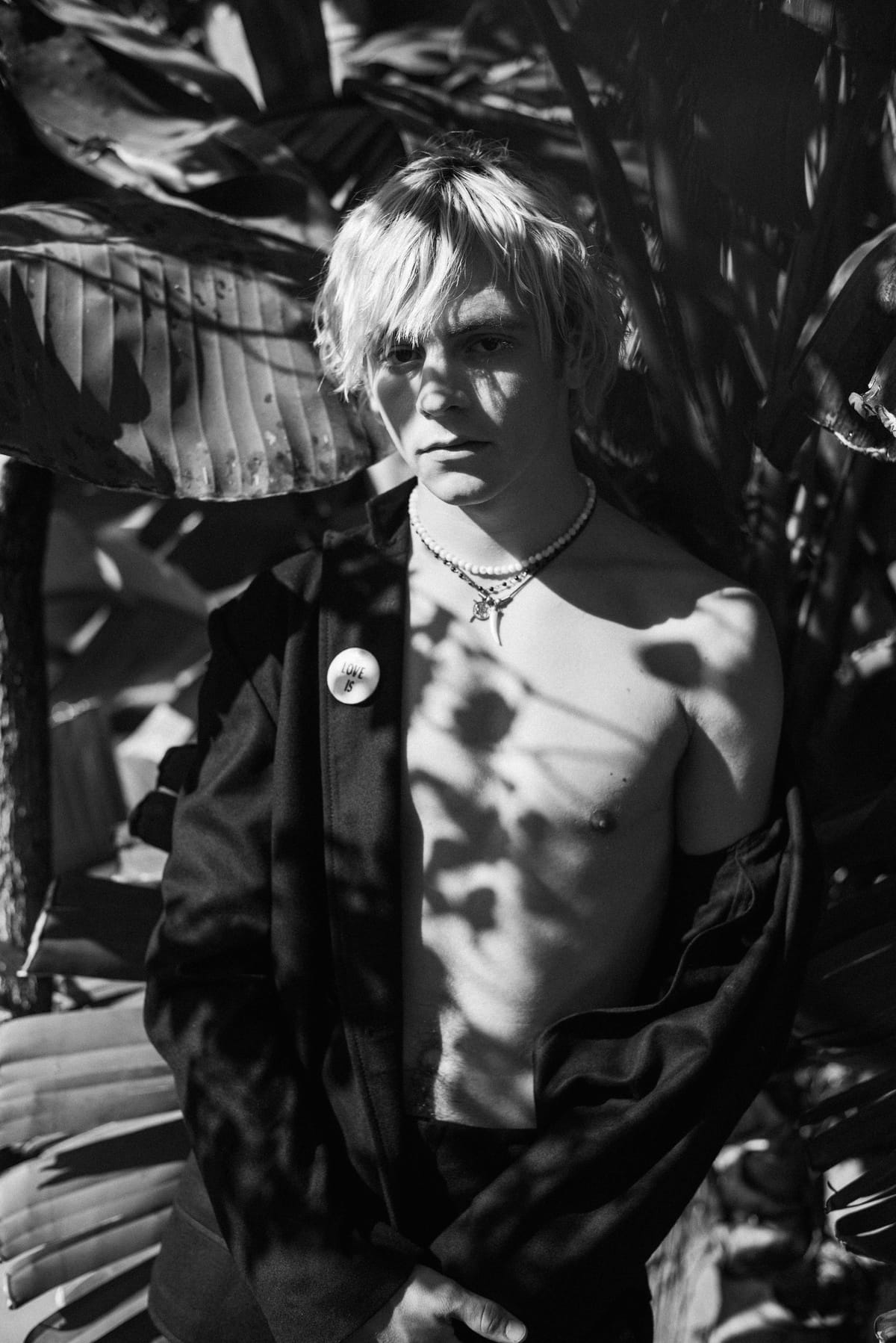Neckless by Palace Costume. Actor: Ross Lynch. Stylist: Sean Knight. Hair Stylist: Lucy Halperin
