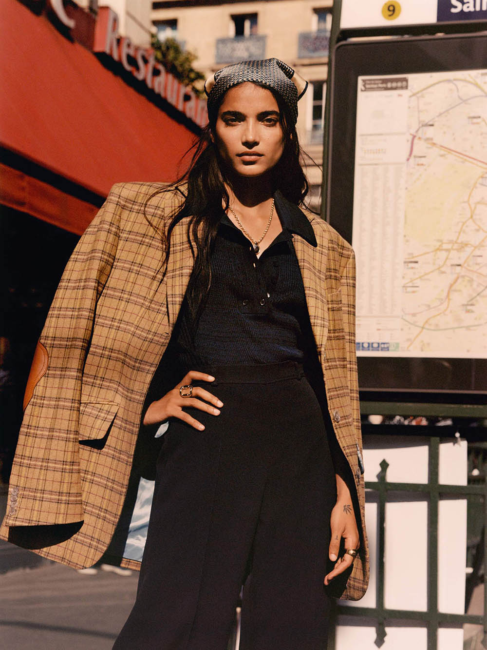 Model: Amrit. Photographer: Quentin De Briey. Stylist: Veronique Didry. Art Director: Phil Buckingham. Hair Stylist: Paolo Soffiatti. Makeup Artist: Karin Westerlund. Blazer, Acne Studios; top, Proenza Schouler; pants, Chloé; scarf, Giuliva Heritage; necklace, Laura Lombardi; ring, Jennifer Fisher; ring, Rasa x Anna Beck