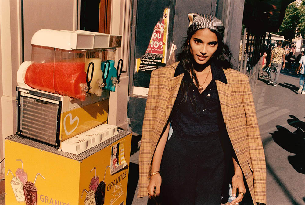 Model: Amrit. Photographer: Quentin De Briey. Stylist: Veronique Didry. Art Director: Phil Buckingham. Hair Stylist: Paolo Soffiatti. Makeup Artist: Karin Westerlund. Blazer, Acne Studios; top, Proenza Schouler; pants, Chloé; scarf, Giuliva Heritage; necklace, Laura Lombardi; ring, Jennifer Fisher; ring, Rasa x Anna Beck