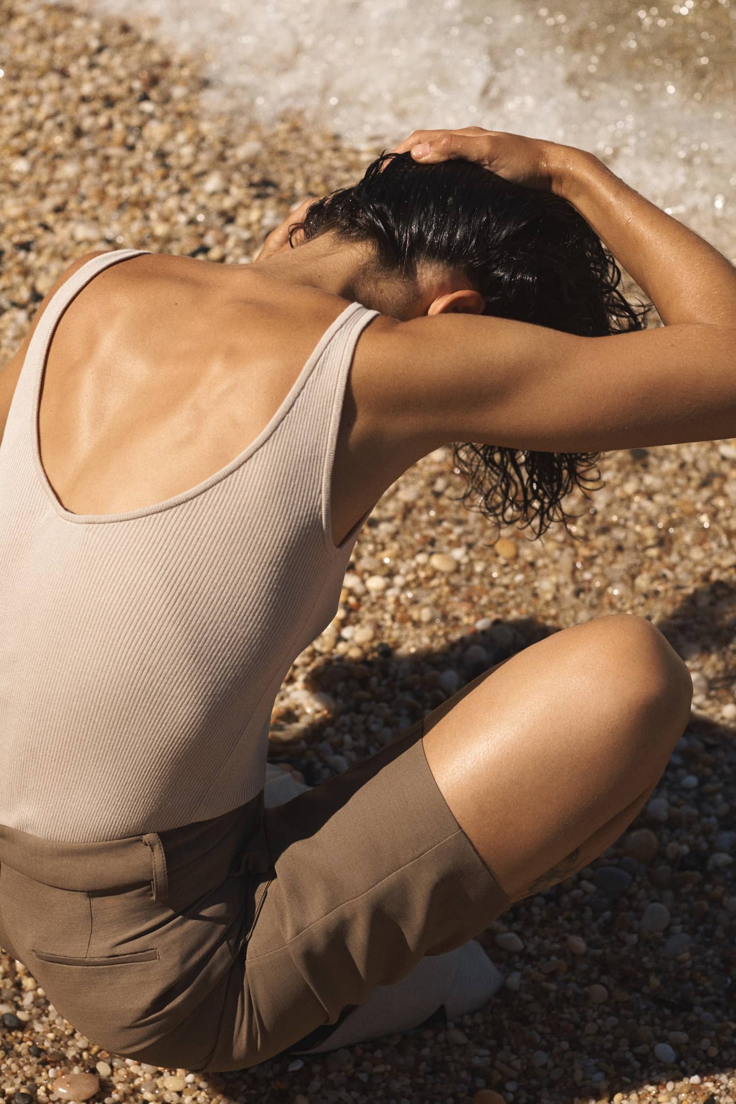 Conie Vallese for CO Spring 2021 Lookbook / Clothing: CO Beige Cashmere tank / CO Army green Woven shorts