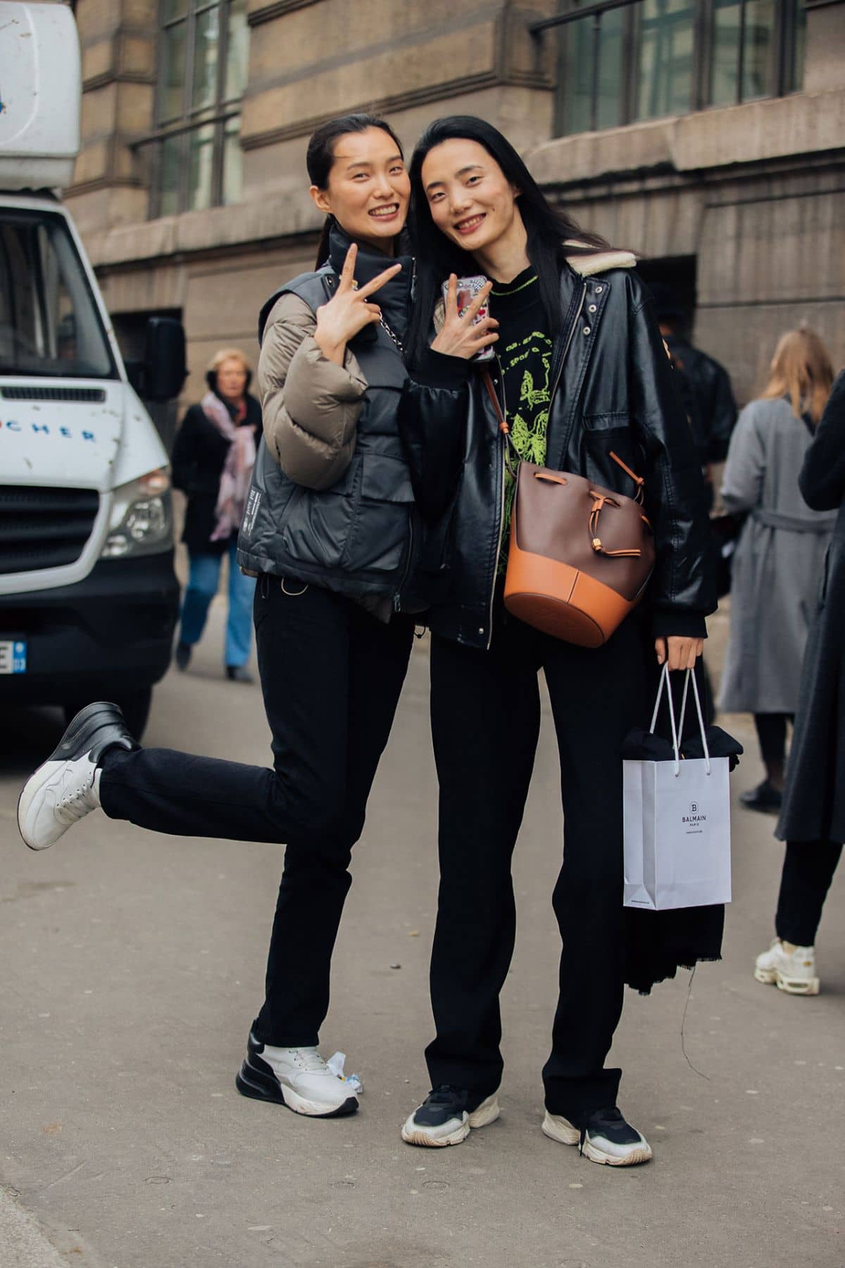 Chunjie Liu & Liu Huan Street Style at Paris Fashion Week Fall-Winter 2020 by Melodie Jeng