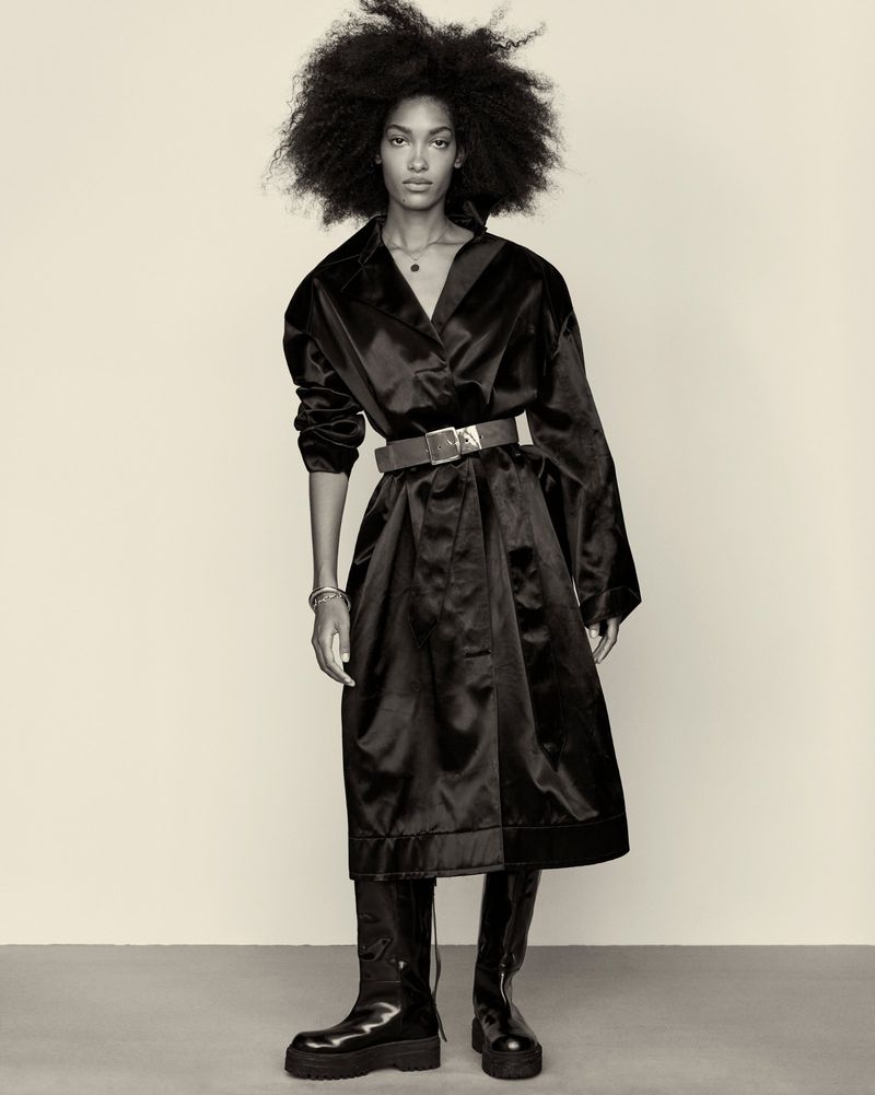 Clothing: coat by Kwaidan Editions, boots by Tibi, belt by Maryam Nassir Zadeh, silver bracelet by Sophie Buhai. 