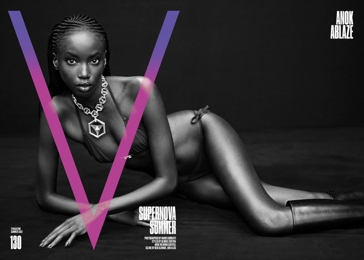 Anok Yai Covers V Magazine Summer 2021. Clothing & Jewelry: Bikini by Celine; Boots by Alaia; Necklace by Cartier