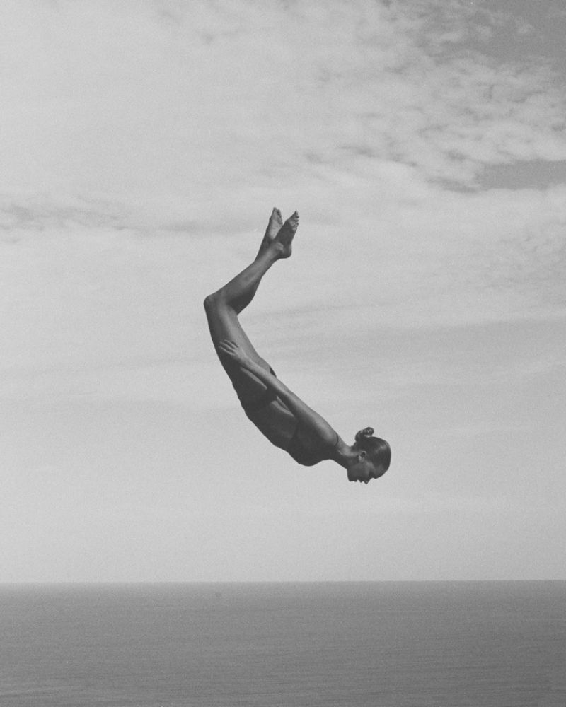 Gabriella Brooks by Jordan Malane & Ilona Hamer for Matteau Summer 2021 Ad Campaign. MATTEAU Black Petite Triangle bikini top / MATTEAU Black Nineties stretch-REPREVE bikini briefs