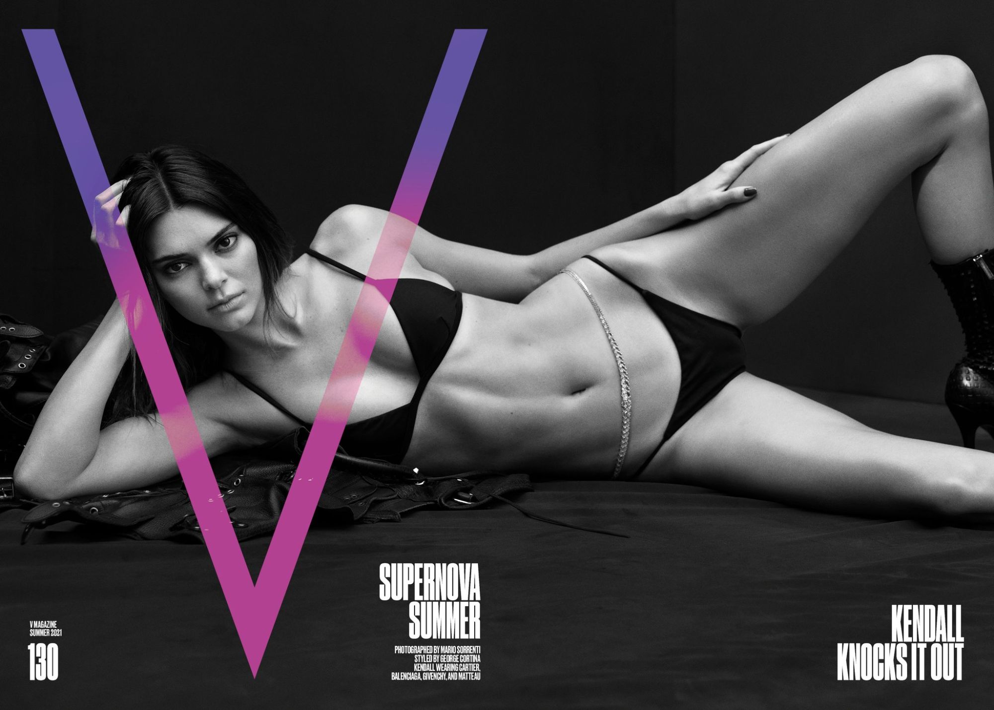 Kendall Jenner Covers V Magazine Summer 2021. Clothing & Jewelry: Matteau Black Petite Triangle recycled bikini top / Matteau Black The Classic bikini briefs; Jacket by Balenciaga; Boots by Givenchy; Necklace by Cartier