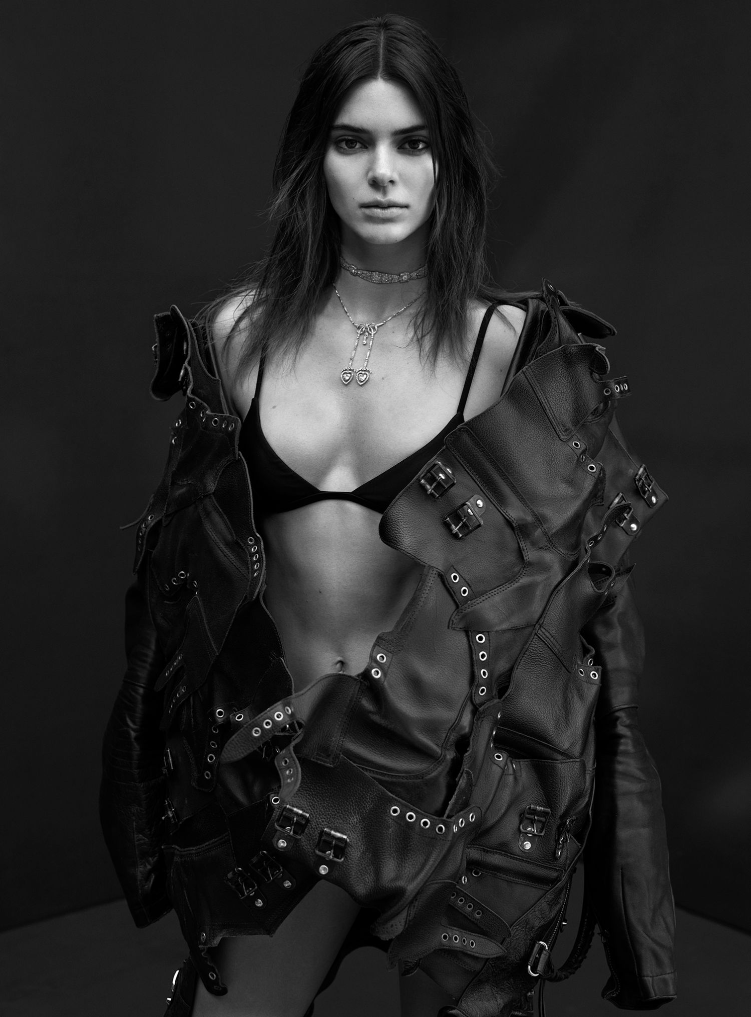Supernova Summer: Kendall Jenner by Mario Sorrenti for V Magazine Summer 2021. Clothing & Jewelry: Matteau Black Petite Triangle recycled bikini top / Matteau Black The Classic bikini briefs; Jacket by Balenciaga; Boots by Givenchy; Necklace by Cartier