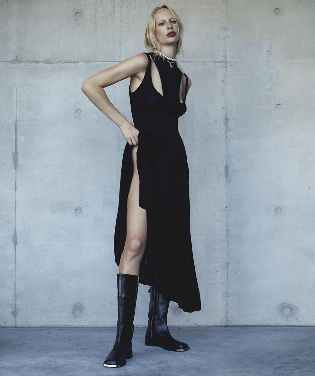 Clothing & Accessories: Dress, Top, Boots by Peter Do; Necklace by Paspaley; Necklace by Tiffany & Co. Model: Lili Sumner. Stylist: Jillian Davison. Hair Stylist: Michele McQuillan. Makeup Artist: Kellie Stratton