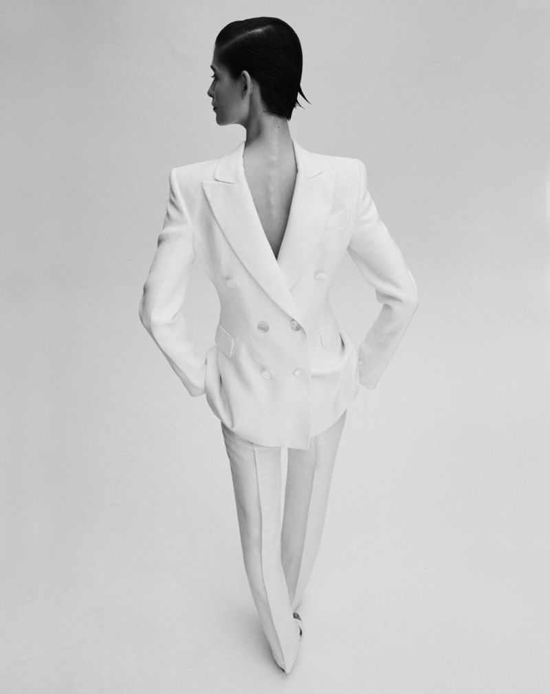 Clothing & Accessories: Suit by PERTEGAZ; Aquazzura White Trish 75mm mules / Photographer: Rocio Ramos. Stylist: Abraham Gutierrez. Beauty Artist: Nacho Fernandez