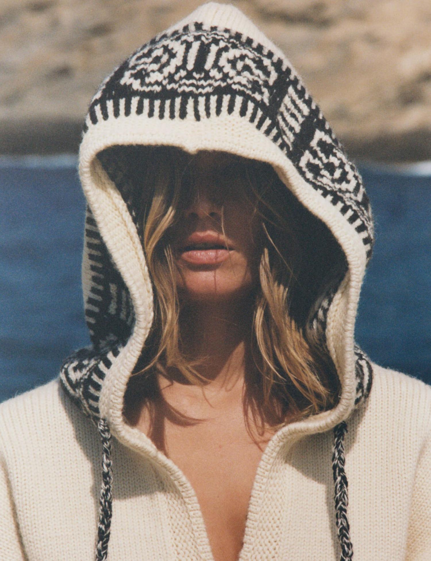 Anna Ewers in Mykonos by Henrik Purienne for Vogue Paris August 2021 Clothing: Sweater by Celine; Makeup using Dior Beauty