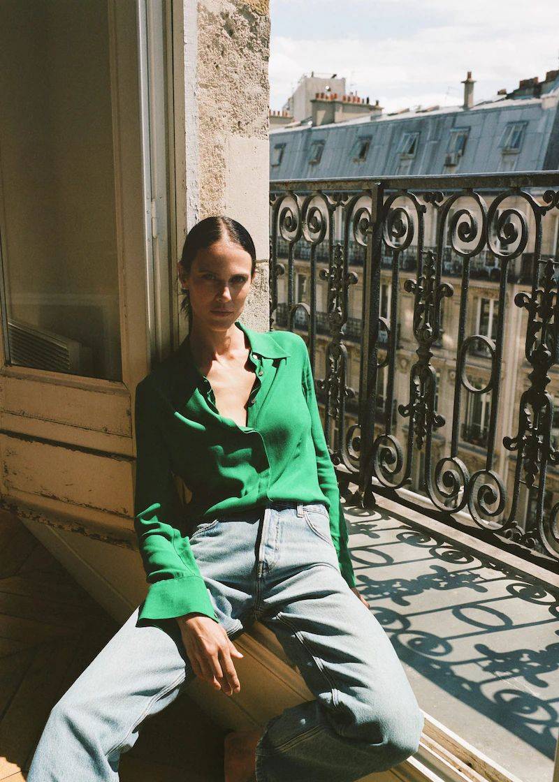 Clothing: Mango High-waist wideleg jeans / Mango Green Oversize shirt / Model: Aymeline Valade. Photographer: Alejandro Sonoro. Stylist: Pili Alamo. Beauty Artist: Egon Crivillers