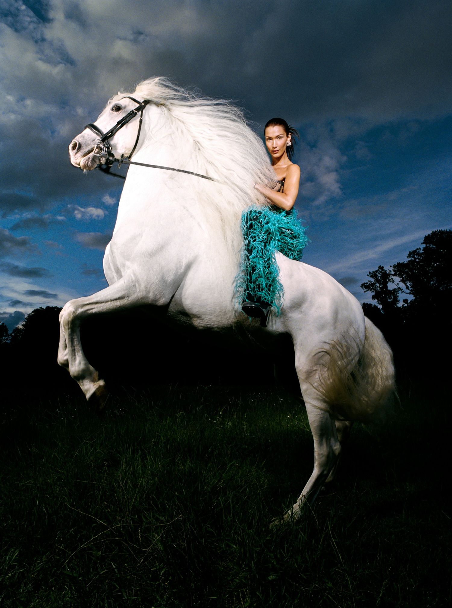 Bella Hadid riding White Horse