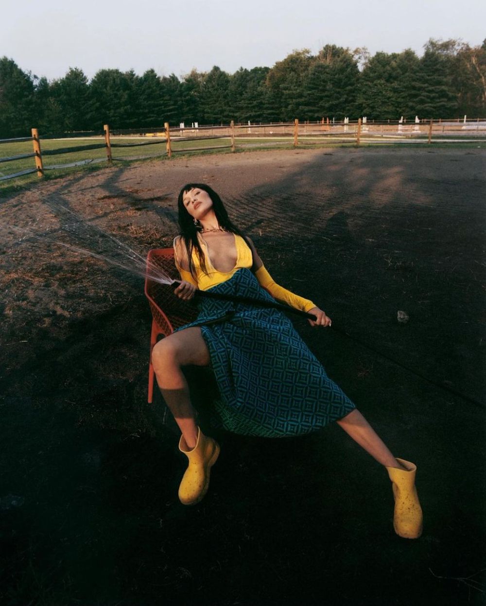Bella Hadid wears Bottega Veneta Yellow Puddle Boots
