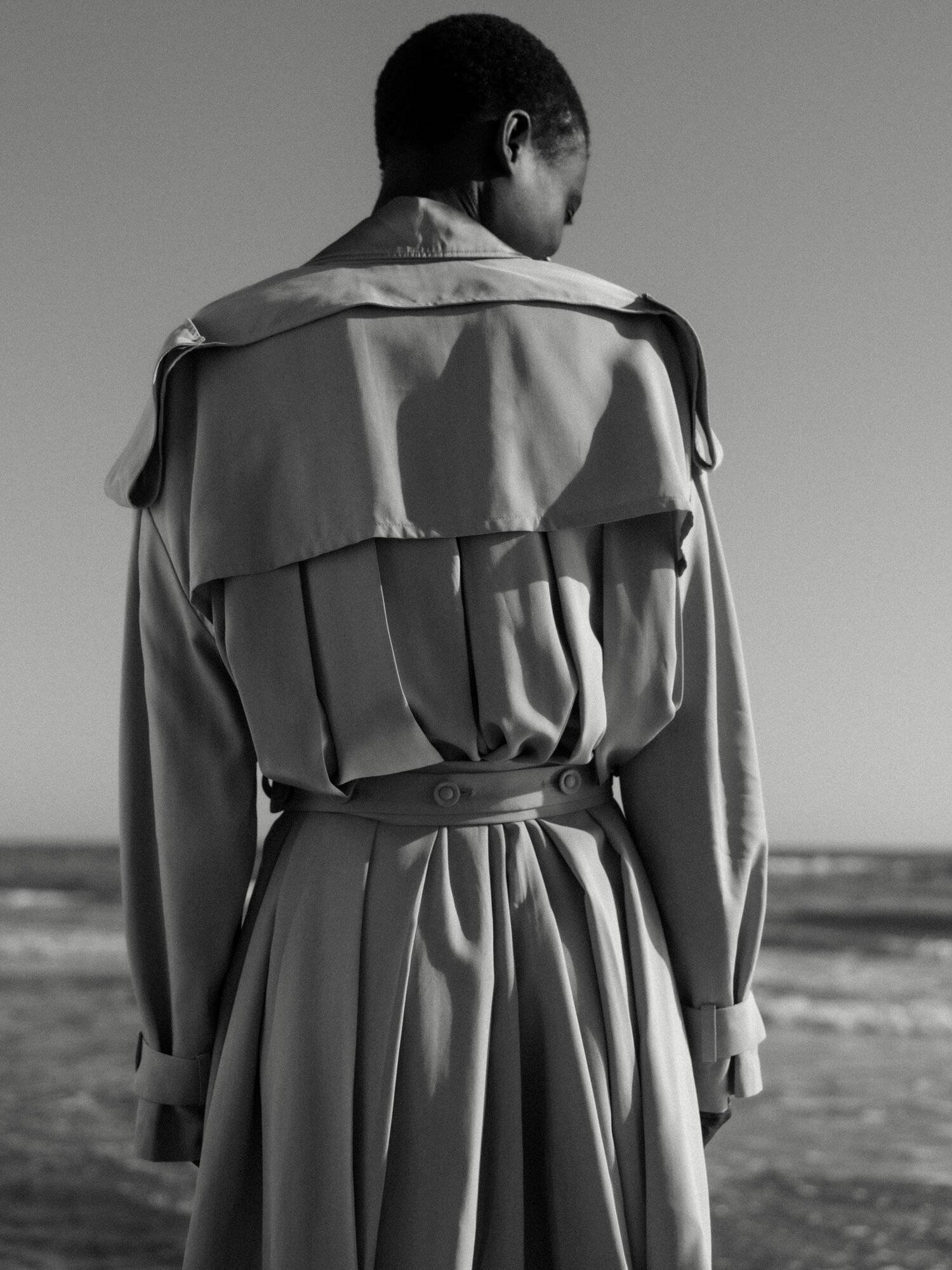  Clothing: Trench Dress by Ports 1961. Stylist: Giulia Querenghi. Beauty Artist: Emilie Green. Location: Camargue, France 