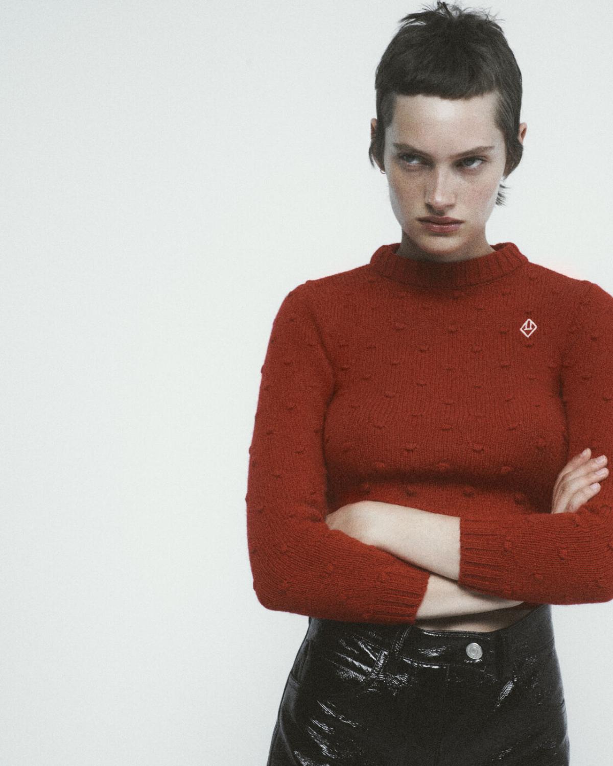Greta Hofer by Robin Galiegue for Self Service Magazine Fall-Winter 2021 Red wool sweater by The Animals Observatory Black patent leather shorts by Saint Laurent 