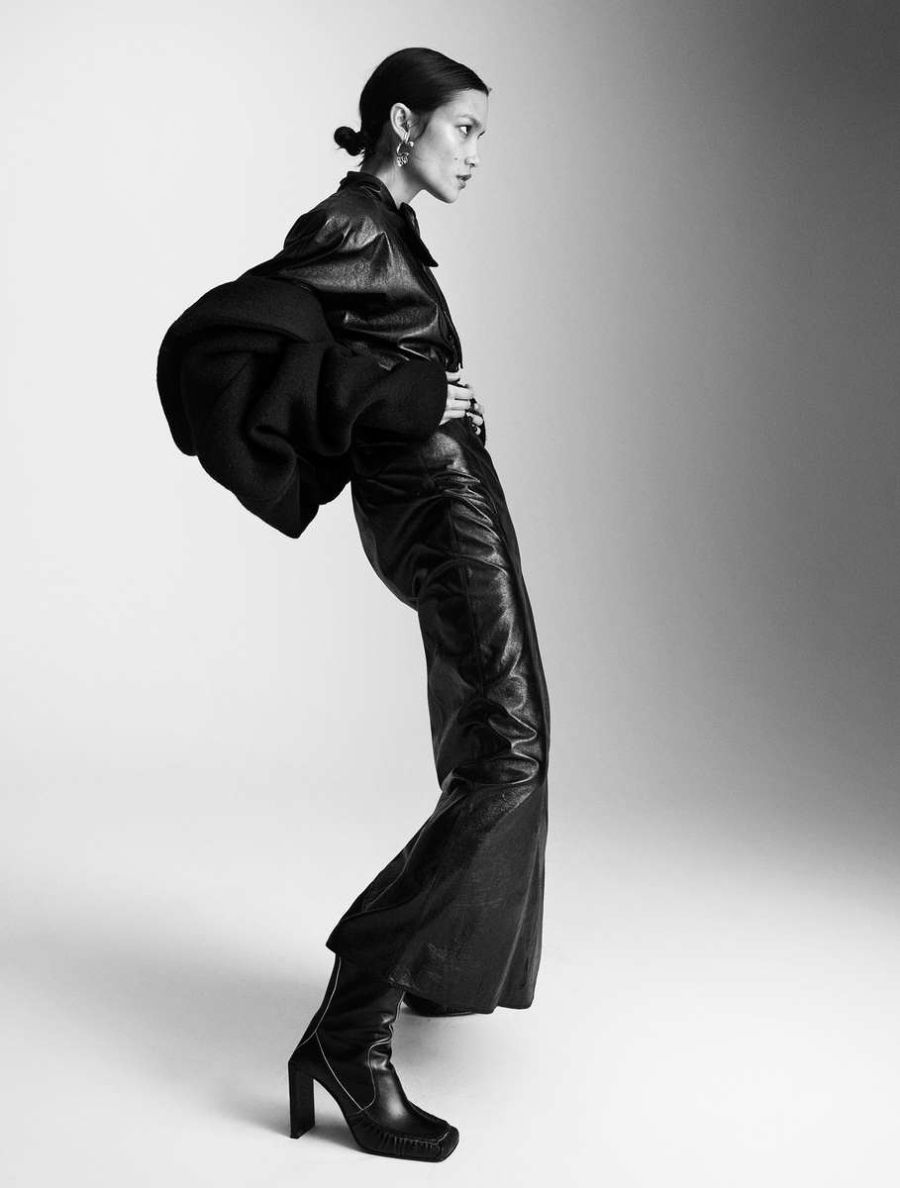 Charlotte Carey by Mattias Bjorklund for Elle Sweden January 2022 Clothing & Accessories: Dress and jacket, both by Isabel Marant / Black Leather ankle boots by Acne Studios / Earrings by Acne Studios