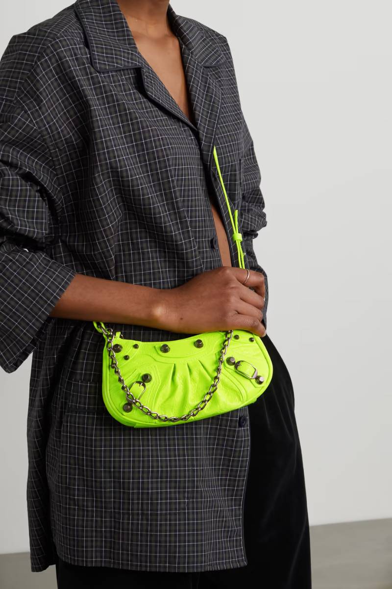 Yellow Le Cagole mini studded neon textured-leather shoulder bag  BALENCIAGA  NET-A-PORTER