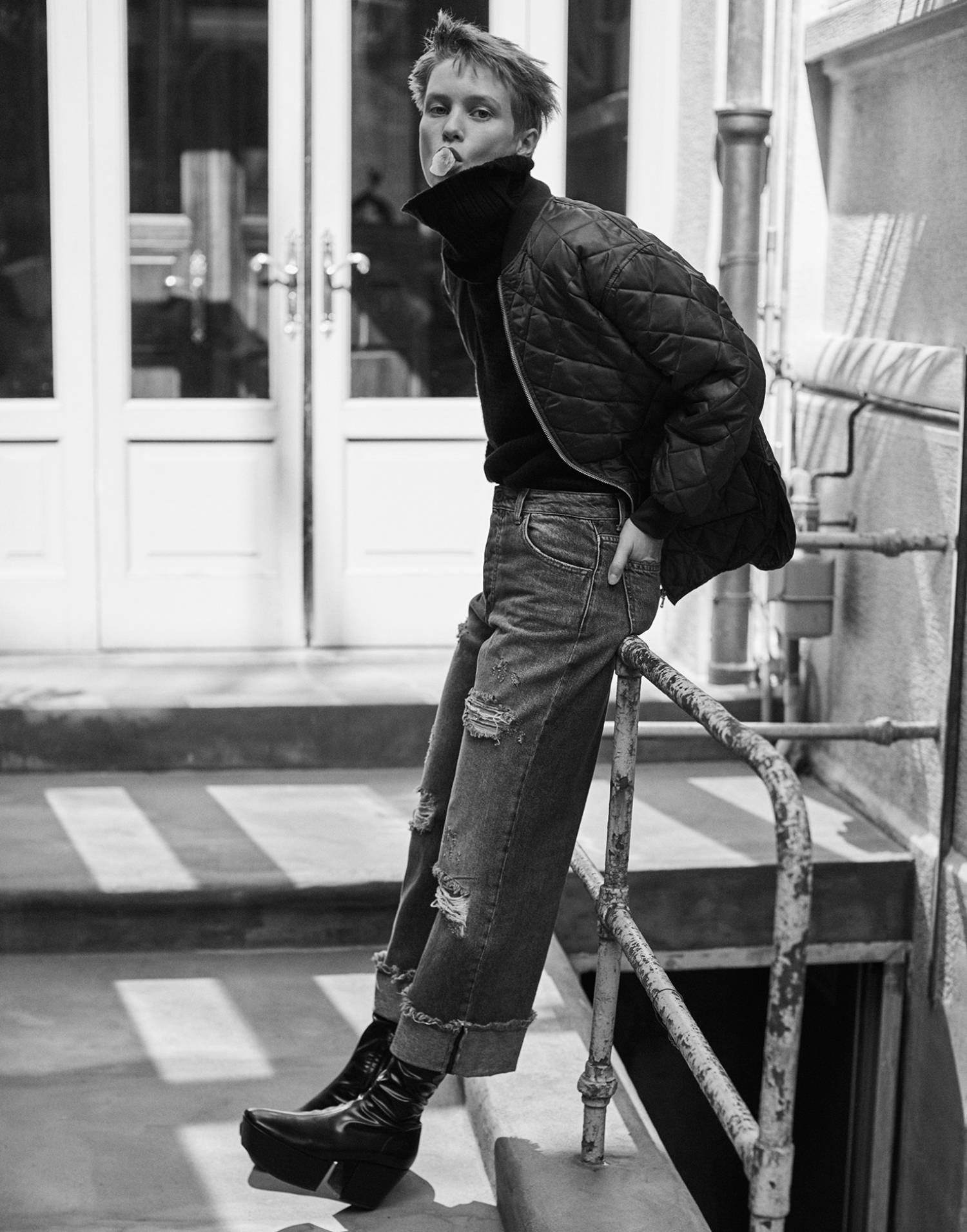 Sofia Hansson by Stefano Galuzzi for Marie Claire Italia November 2021 Clothing & Accessories: Quilted polyester jacket and jeans by Peperosa; Sleeveless sweater in wool and cashmere by Les Copains; Boots by Prada