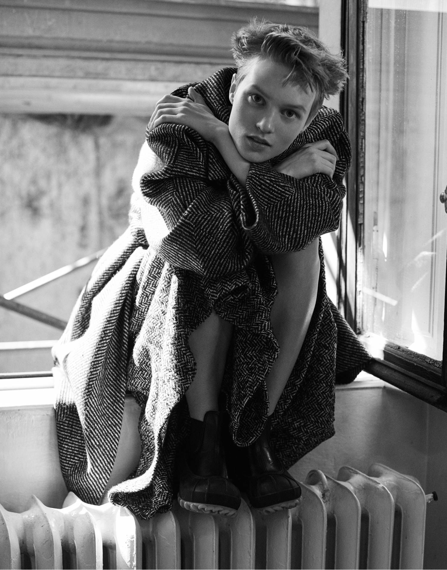 Sofia Hansson by Stefano Galuzzi for Marie Claire Italia November 2021 Clothing & Accessories: Chevron coat and full skirt in herringbone tweed by Alessandro Dell'Acqua x Elena Miro; Faux leather ankle boots by Stella McCartney