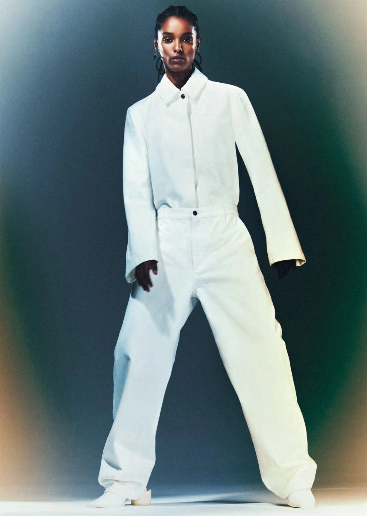 Malika Louback by Thue Norgaard for British Vogue July 2022 White Somie Shirt by The Row / White Louie Jeans by The Row / Leather Mules by MM6 Maison Margiela 