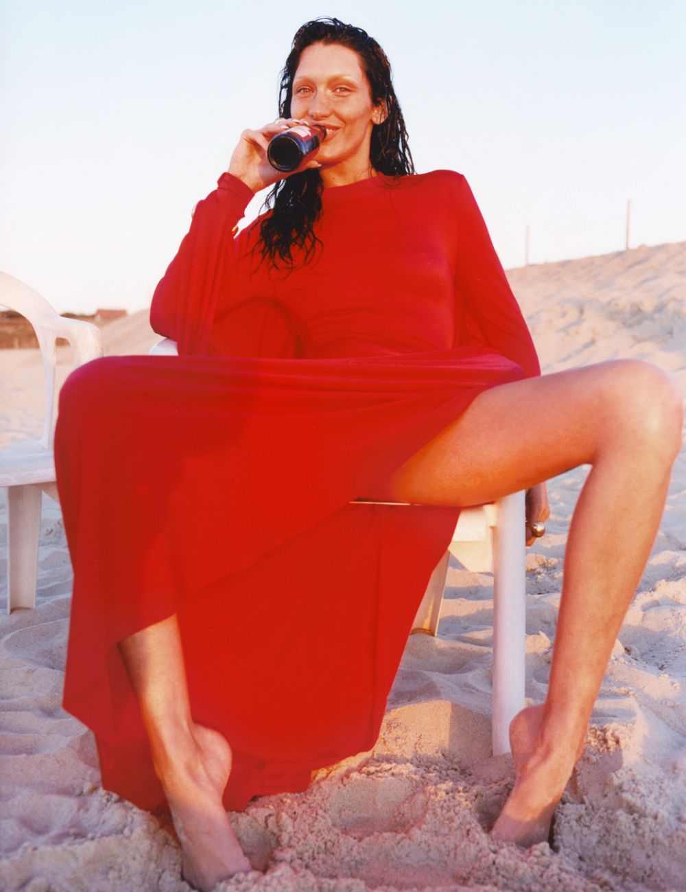 Bella Hadid No Makeup Beach Look in Balenciaga Red Maxi Dress