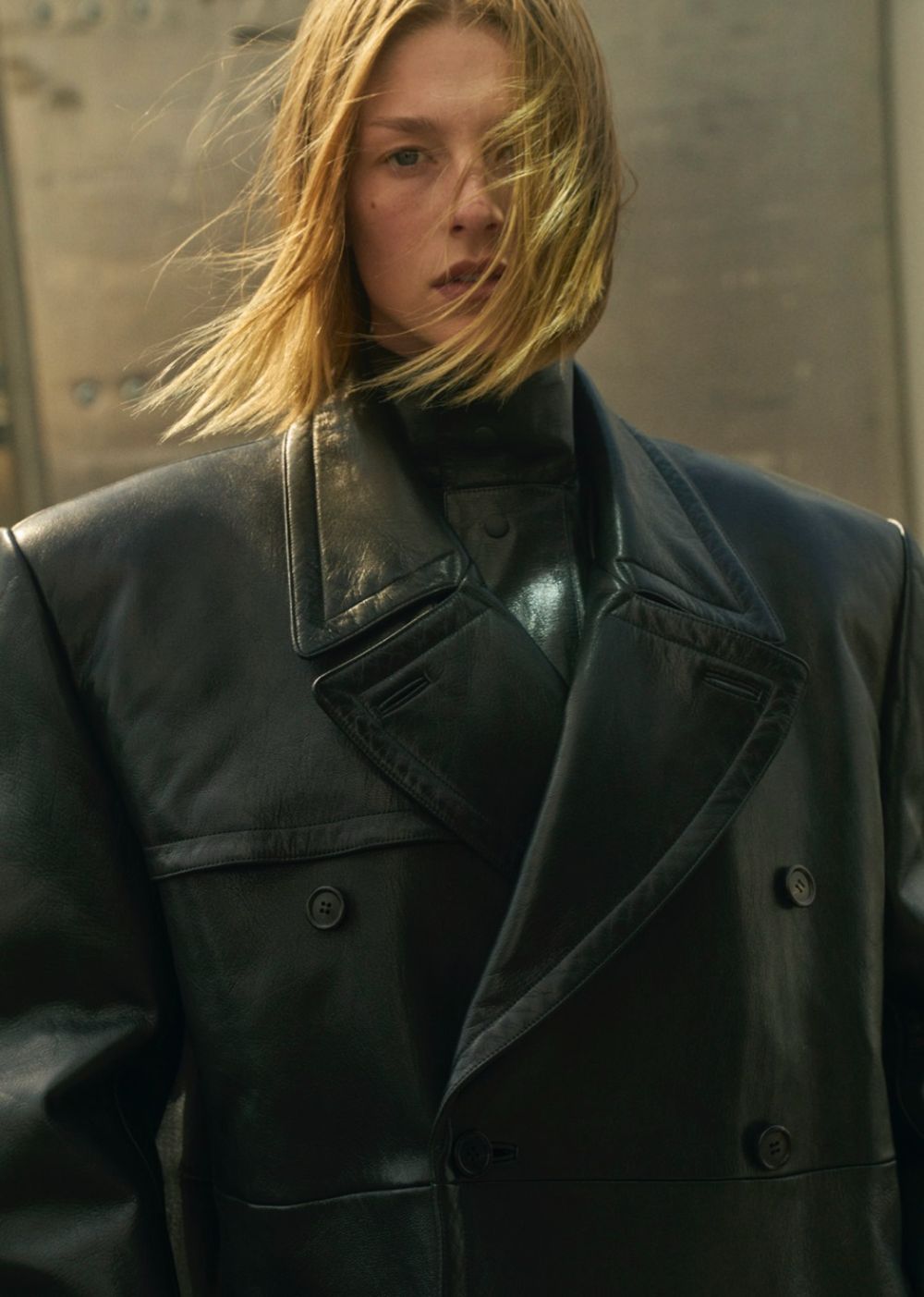 Hunter Schafer wears Prada Double-Breasted Leather Coat Outfit