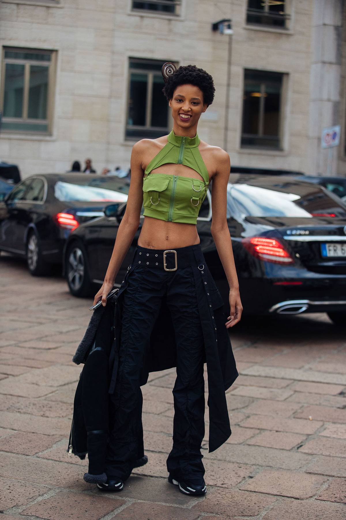 Janaye Furman wears SHEIN ICON Green Open Back Peekaboo Front Ring and Flap Detail Halter Top at Milan Fashion Week Spring-Summer 2023
