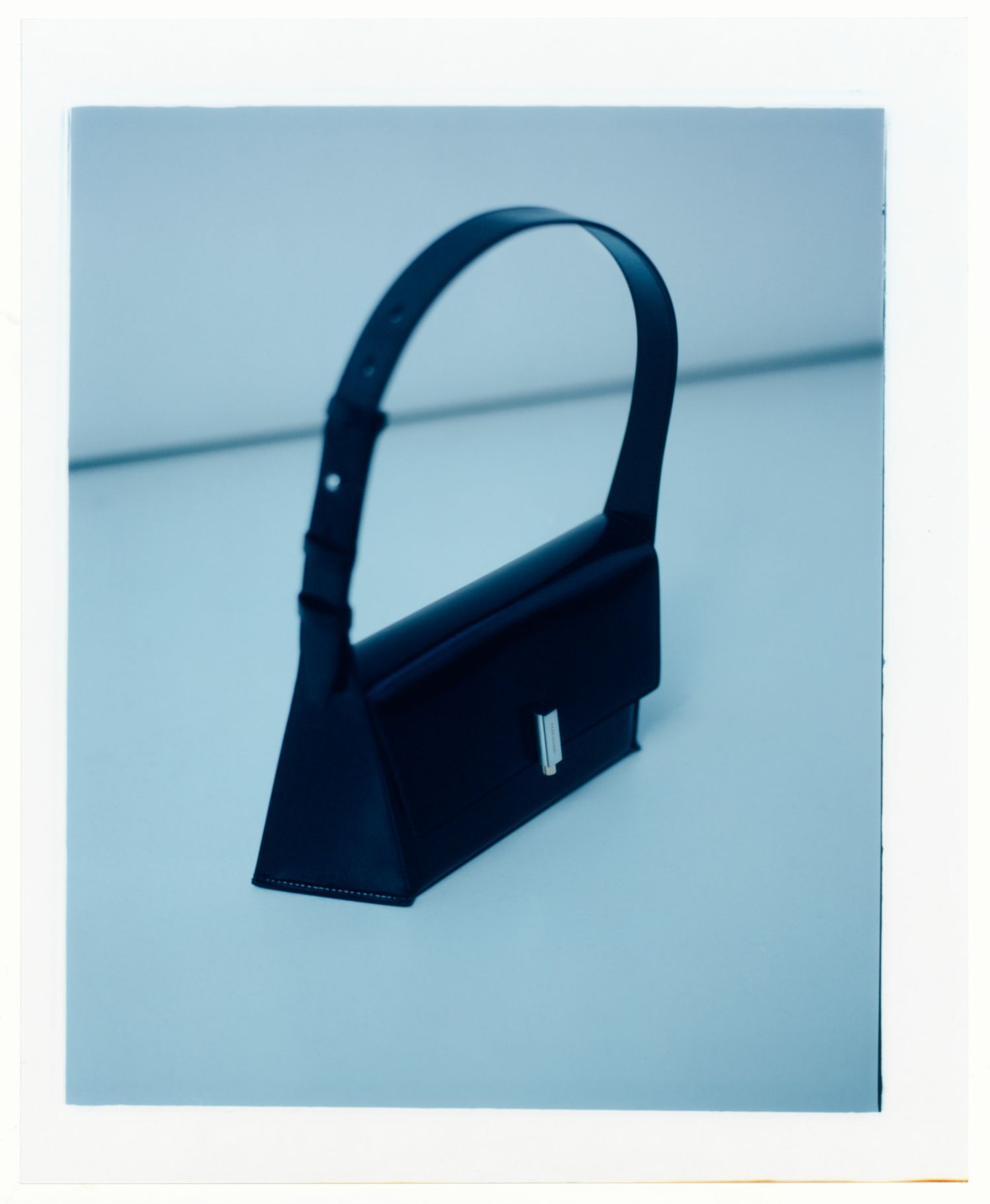 Black Geometric Shoulder Bag by Ferragamo, The Duality of Dressing