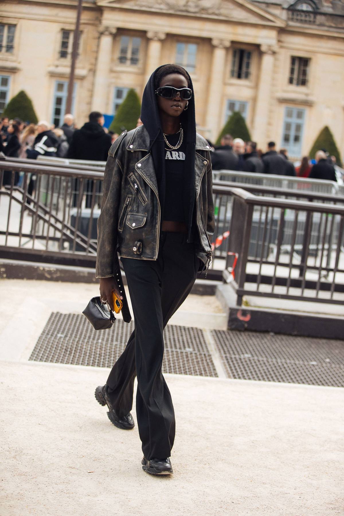 Anok Yai Faded Leather Jacket Micro Bag Rombaut Black Nucleo Sneakers Off-Duty Model Outfits at Paris Fashion Week Fall-Winter 2023