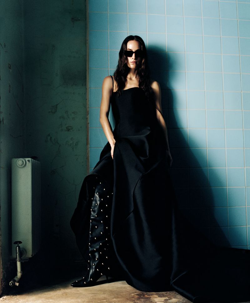 Valentino Black Gown, Magda Butrym Black Over-the-Knee Leather Boots, Saint Laurent Black Mica cat-eye acetate sunglasses 