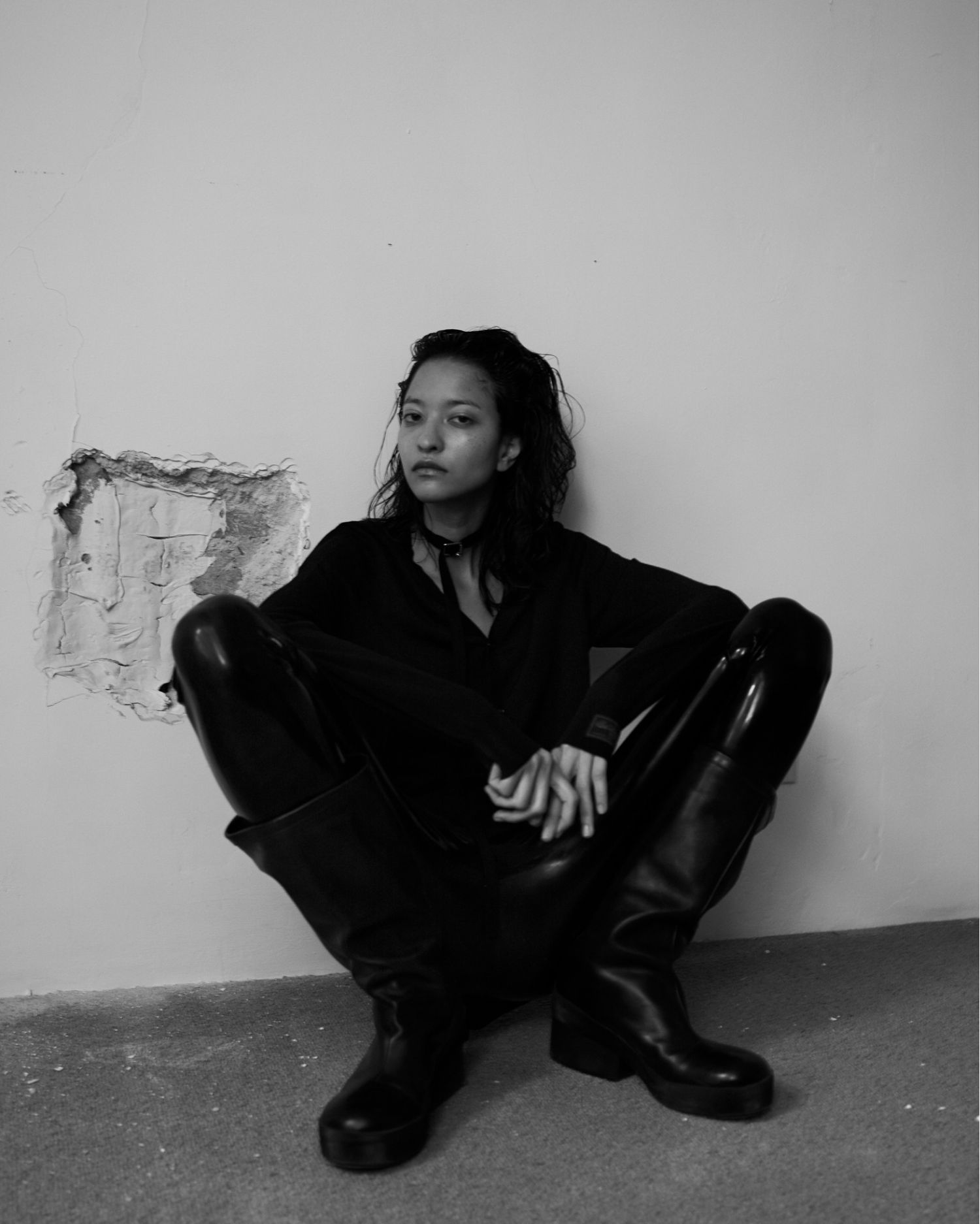 America Gonzalez in Raf Simons Black Embossed Boots by Amy Troost for Re-Edition Magazine Spring-Summer 2023