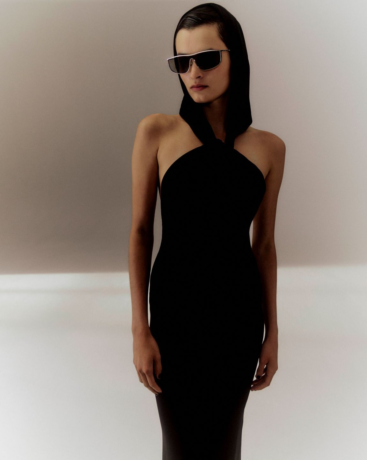 Saint Laurent Black Halterneck hood backless crepe gown, Saint Laurent Silver Luna rectangle metal sunglasses