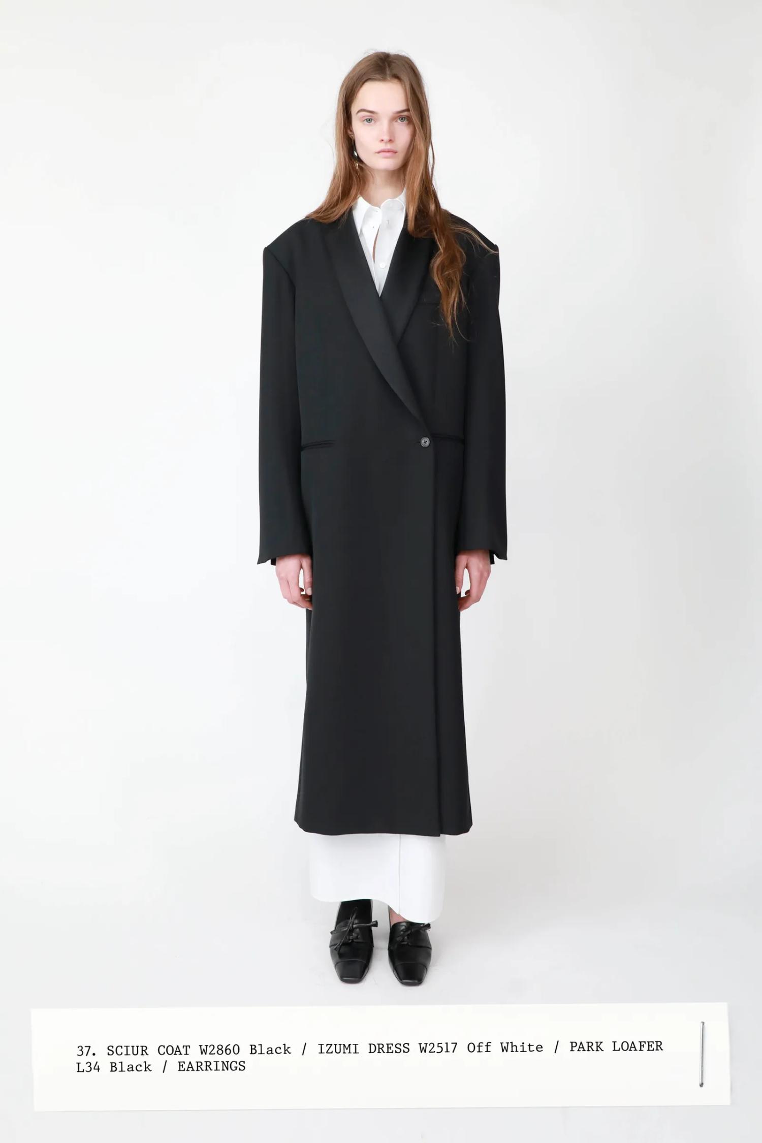 Lulu Tenney for The Row Spring 2024 Lookbook styled by Brian Molloy Neiman Marcus Coat