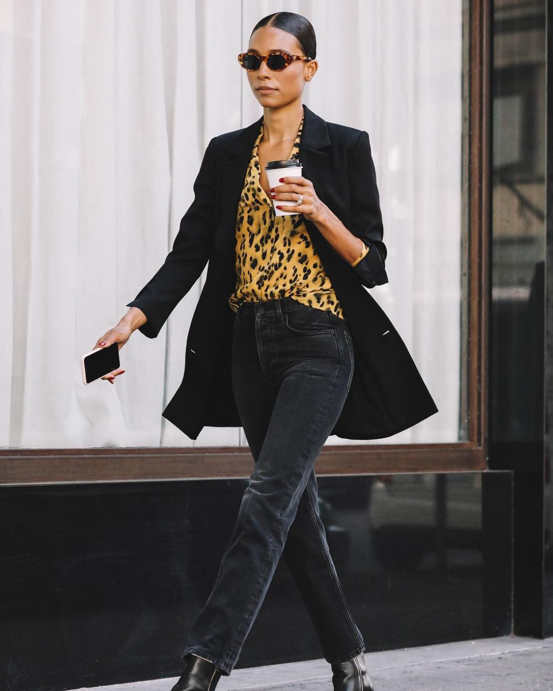 Tylynn Nguyen wears Anine Bing Black Blazer, Blouse, Jeans, Sunglasses Outfit