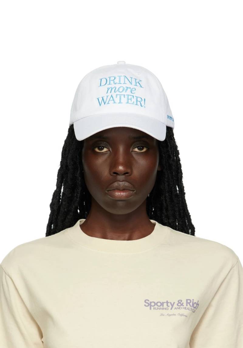 White 'Drink More Water' Cap by Sporty & Rich on Sale