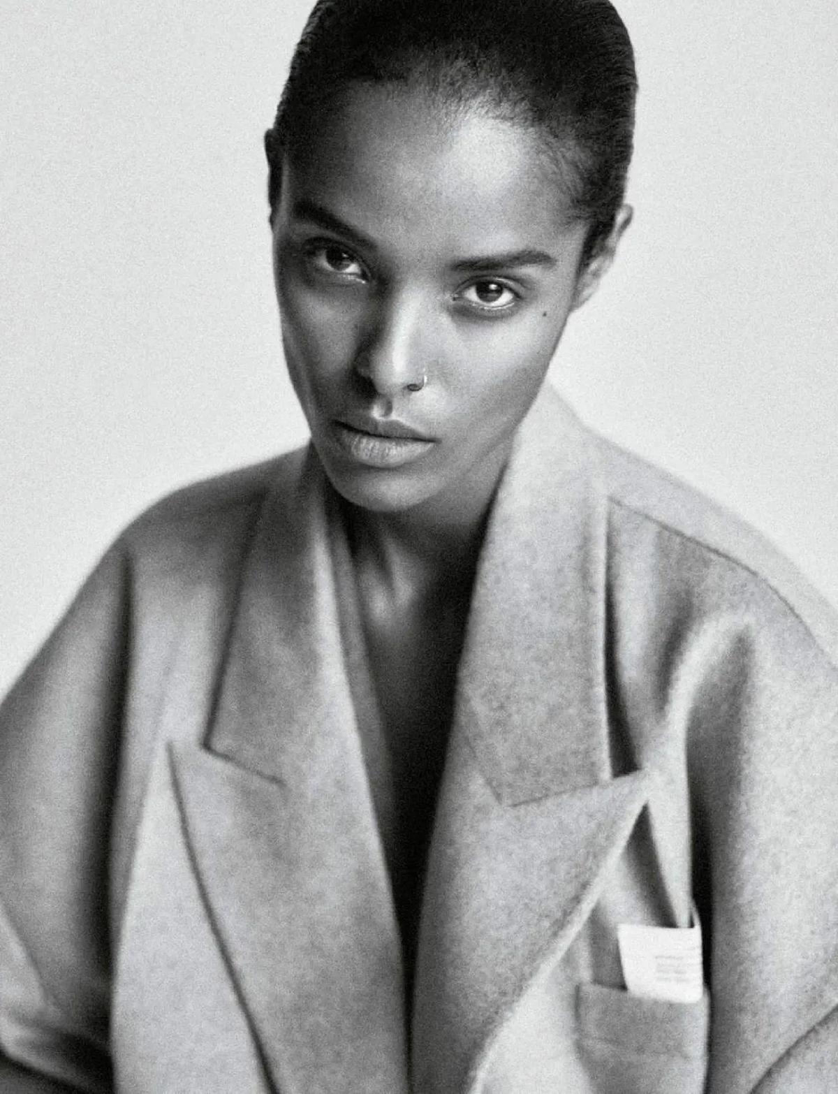 Malika Louback in Rokh Coat by Chris Colls for Elle France August 2023