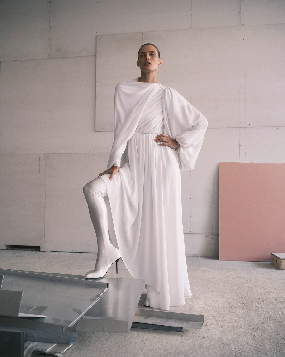 Malgosia Bela in Balenciaga White All In draped crepe dress by Wunsche & Samsel for Vogue Poland October 2023