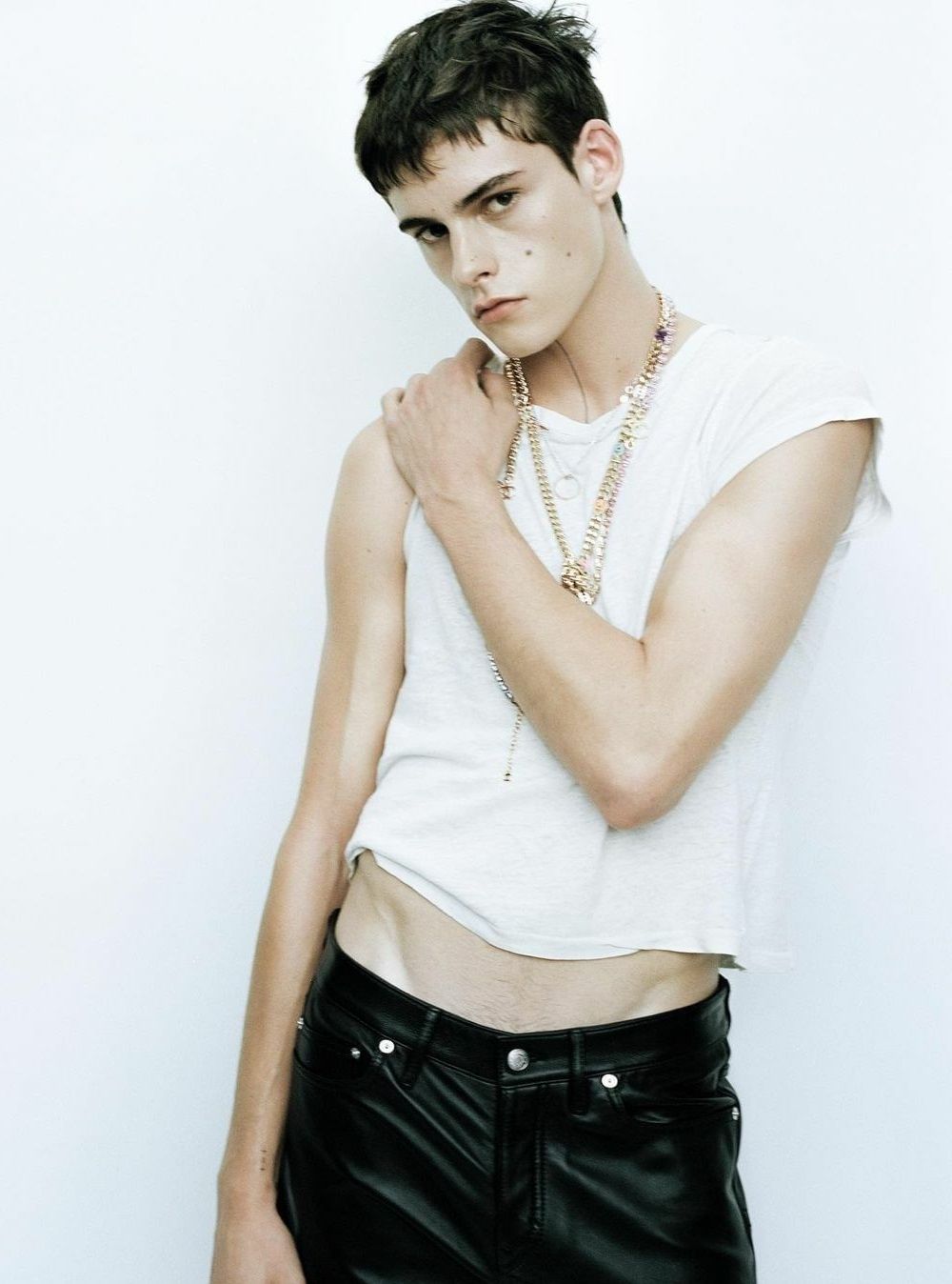 Arthur Hargous in Re/Done White T-Shirt, Zadig & Voltaire Black Leather Pants, Chanel Metal Necklace
