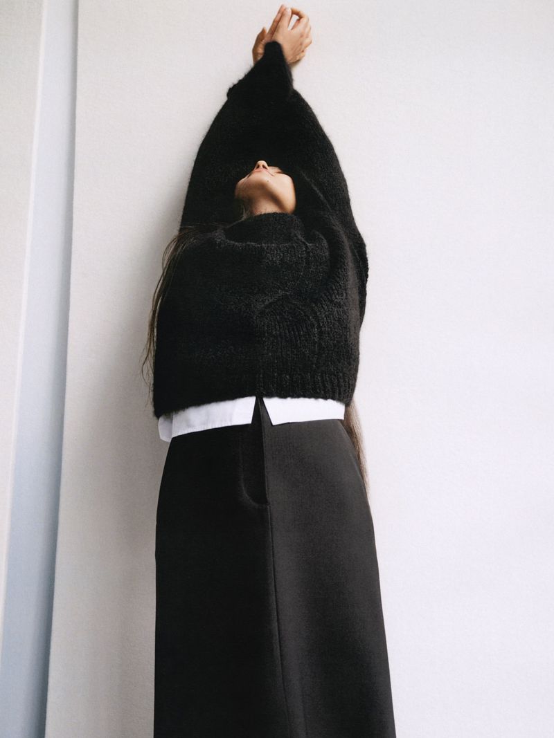 Varsha Thapa wears Arket Black Midi Skirt Fall-Winter 2023 Layers