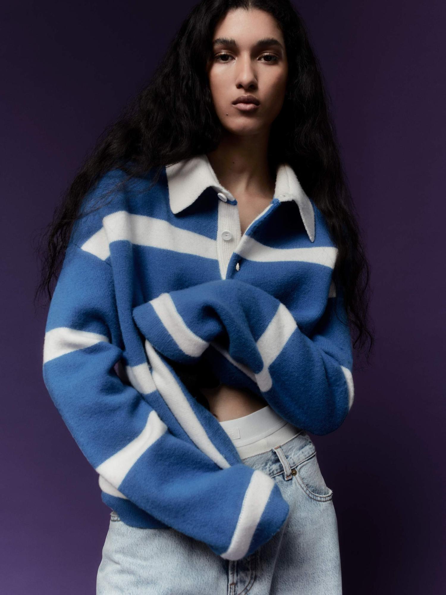Jennifer Matias in JW Anderson Blue Polo Sweater by Fiona Torre for Porter Magazine January 2024 Feel-Good Foundations