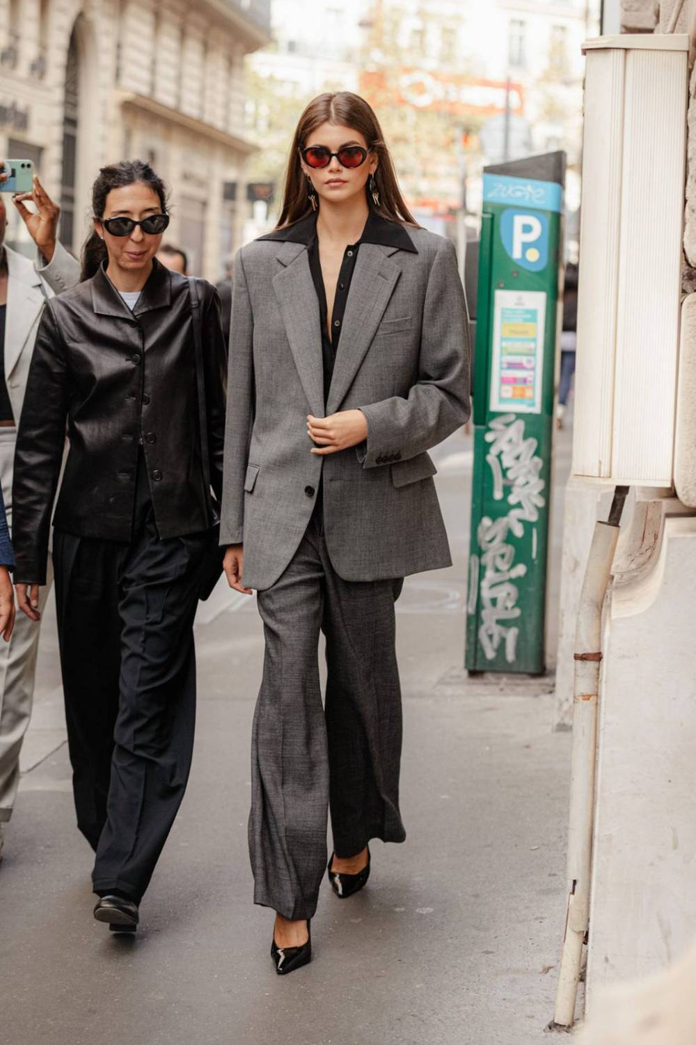 Kaia Gerber The Row Grey Suit Celine oval sunglasses Paris Spring-Summer 2024 Trends 