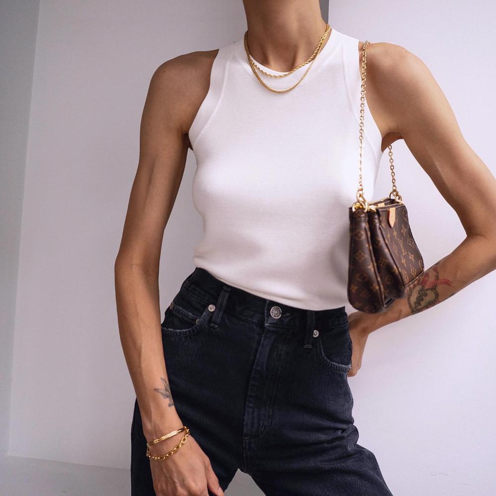 Pepa Mack Minimal Fashion White Tank Top,Black Jeans, Louis Vuitton Small Bag