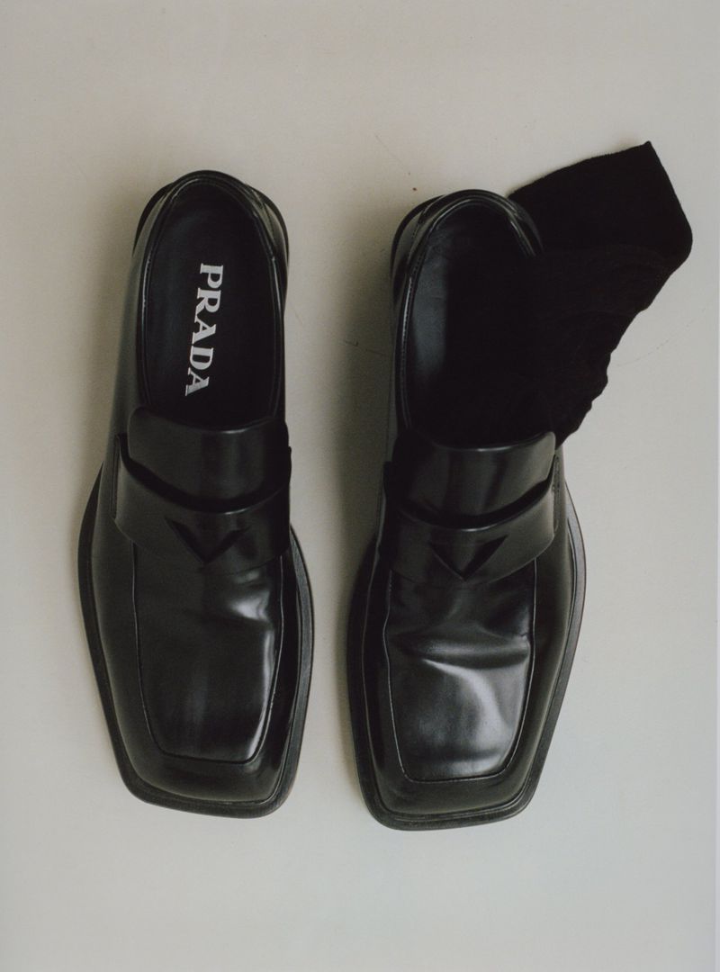 Prada Black triangle-patch Leather Loafers Minimalist Fashion Editorials